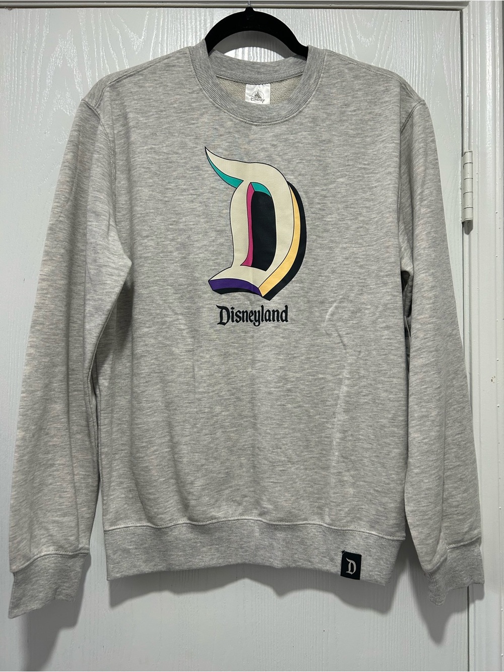 NWT Disney Parks Disneyland Resort D Logo Unisex Light Gray Crewneck Sz Small